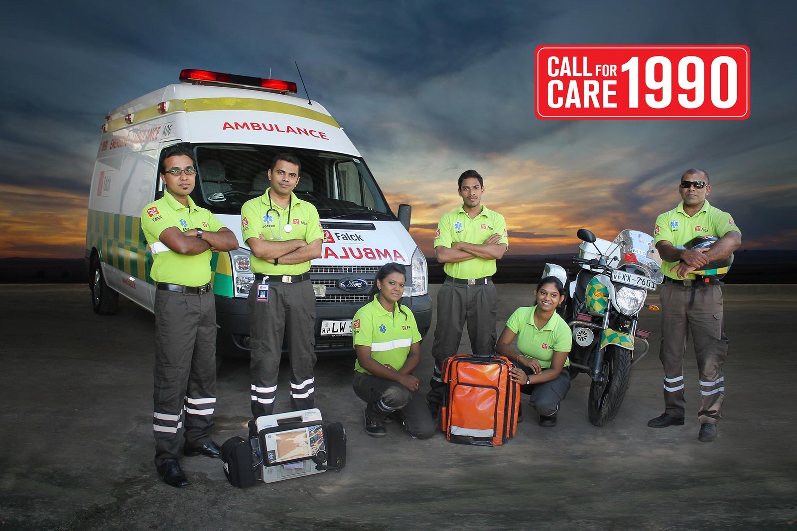 The Falck Sri Lanka emergency medical services team, with ambulance, response motorcycle, and medical equipment