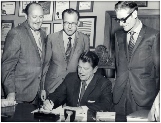 Governor Ronald Reagan signs the Wedworth-Townsend Act